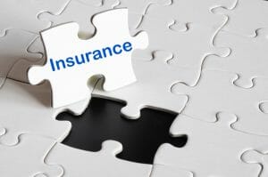 insurance concept with white puzzle or jigsaw